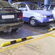 Topes de estacionamiento para estaciones de carga eléctrica